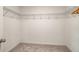 Spacious walk-in closet with ample shelving, offering plenty of room for organization and storage at 947 Edwin Ln, Sugar Hill, GA 30518