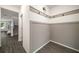 Inviting entryway with gray wainscoting, stylish hooks, and a seamless transition to the staircase at 947 Edwin Ln, Sugar Hill, GA 30518