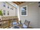 Charming balcony with comfortable seating; the perfect spot to relax and enjoy the outdoors at 134 Everley Walk, Alpharetta, GA 30009