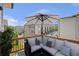 Private balcony with a cozy seating area and a scenic view of the neighborhood at 134 Everley Walk, Alpharetta, GA 30009