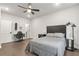 Large bedroom featuring hardwood floors, recessed lighting, and desk area at 134 Everley Walk, Alpharetta, GA 30009