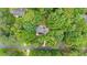 Aerial view of the home nestled amongst mature trees in a desirable neighborhood at 3713 Brigantine Ct, Acworth, GA 30102