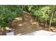 Spacious, private backyard surrounded by mature trees, offering serene outdoor living at 3713 Brigantine Ct, Acworth, GA 30102