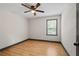 Bright bedroom with natural light, ceiling fan, and stylish flooring at 3713 Brigantine Ct, Acworth, GA 30102