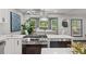 Modern kitchen featuring stainless steel appliances, white countertops, and stylish pendant lighting at 3713 Brigantine Ct, Acworth, GA 30102