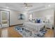 Spacious main bedroom featuring hardwood floors, natural light, and stylish decor at 3713 Brigantine Ct, Acworth, GA 30102