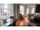 Cozy Living Area with a Dining Nook, lots of natural light, and gleaming Hardwood floors at 57 Forsyth Nw St # 11B, Atlanta, GA 30303