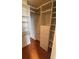 Functional walk-in closet with built-in shelving and drawers for optimal storage at 57 Forsyth Nw St # 11B, Atlanta, GA 30303