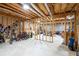 Unfinished basement with exposed beams and walls providing lots of storage at 2260 Falkirk Pointe Dr, Marietta, GA 30062