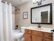 Bathroom features a shower/tub combo, single sink vanity, and neutral paint at 2260 Falkirk Pointe Dr, Marietta, GA 30062