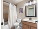 Bathroom with a shower/tub combo, single sink vanity, and tile flooring at 2260 Falkirk Pointe Dr, Marietta, GA 30062