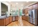 Bright kitchen featuring stainless steel appliances, ample counter space, and easy access to dining and living areas at 2260 Falkirk Pointe Dr, Marietta, GA 30062