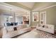 Relaxing living space shows open floor plan connecting to dining and kitchen areas, perfect for modern living at 2260 Falkirk Pointe Dr, Marietta, GA 30062