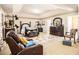 Large bedroom with a sitting area and furnishings at 3621 Guinevere Trce, Douglasville, GA 30135