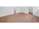 Bright bedroom features a hallway to the bathroom and two closets at 401 Cottonwood Dr, Woodstock, GA 30189