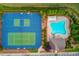 Aerial view of the community pool and tennis courts, perfect for recreation and relaxation at 4405 Donahue Ave, Sugar Hill, GA 30518