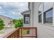 Balcony view of parking, green space, and other buildings in the complex at 4405 Donahue Ave, Sugar Hill, GA 30518