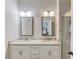 Bathroom features double sink vanity with granite countertops and walk-in shower at 4405 Donahue Ave, Sugar Hill, GA 30518