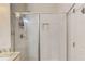 Bright bathroom features white marble-tiled walk-in shower with a niche at 4405 Donahue Ave, Sugar Hill, GA 30518