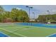 Well-maintained tennis courts for residents to enjoy a friendly match or practice their skills at 4405 Donahue Ave, Sugar Hill, GA 30518
