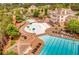 Aerial view showing clubhouse, pools, waterslides, and sunbathing areas in an amenity rich community at 233 Retreat Ln, Canton, GA 30114