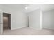 Spacious bedroom with a ceiling fan and access to other rooms at 233 Retreat Ln, Canton, GA 30114