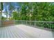 Relaxing deck space surrounded by lush greenery at 233 Retreat Ln, Canton, GA 30114