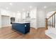 Modern kitchen with a blue island, stainless steel appliances, and plenty of storage at 233 Retreat Ln, Canton, GA 30114