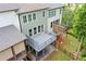 Exterior view of a home featuring multiple decks and outdoor spaces at 233 Retreat Ln, Canton, GA 30114