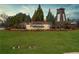 Community entrance sign amidst a well-manicured lawn and landscaping at 372 Garnet Dr, Acworth, GA 30101