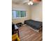 Modest bedroom with hardwood floors, and a window with neutral walls and furnishings at 405 Fairburn Sw Rd # 64, Atlanta, GA 30331