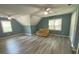 Large bedroom with ceiling fans, good natural light, and new flooring in a freshly painted room at 4635 Tims Pl, Snellville, GA 30039