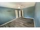 Spacious bedroom featuring new flooring, neutral paint, and ample closet space at 4635 Tims Pl, Snellville, GA 30039