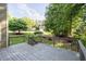 View from the wooden deck overlooking a well-maintained lawn and neighboring homes at 1001 Braelin Ct, Woodstock, GA 30189