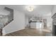 Open floor plan showcasing the living room, kitchen, and staircase at 1001 Braelin Ct, Woodstock, GA 30189