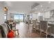 Bright, open-concept living room and kitchen with hardwood floors and large windows offering city views at 270 17Th Nw St # 2804, Atlanta, GA 30363