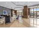 Spacious lobby with modern furnishings, wood accents, and floor-to-ceiling windows at 270 17Th Nw St # 2804, Atlanta, GA 30363