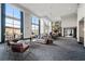 Bright lounge area with high ceilings, large windows, comfortable seating, and stylish decor at 270 17Th Nw St # 2804, Atlanta, GA 30363