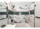 Stylish bathroom with a tiled shower and sleek fixtures at 3219 W Manor Ln, Atlanta, GA 30311