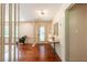 Elegant foyer with hardwood floors, a decorative light fixture, and an inviting atmosphere at 3219 W Manor Ln, Atlanta, GA 30311