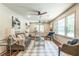 Cozy living area with large windows, plush seating, and stylish decor at 3219 W Manor Ln, Atlanta, GA 30311