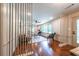 Bright living room featuring hardwood floors, fresh paint, and modern furnishings at 3219 W Manor Ln, Atlanta, GA 30311
