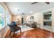 Charming living room with hardwood floors, stylish seating, and an open layout at 3219 W Manor Ln, Atlanta, GA 30311