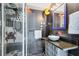 Fun bathroom with custom video game themed wall art and modern fixtures at 3493 Wood Acres Blvd, Duluth, GA 30096