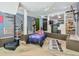 Unique themed bedroom with spiral staircase, gaming accents, and unique floor design at 3493 Wood Acres Blvd, Duluth, GA 30096