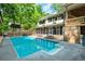 Large backyard pool with plenty of space for relaxing and entertaining at 3493 Wood Acres Blvd, Duluth, GA 30096