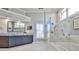 A luxurious bathroom featuring a glass shower, soaking tub, and dual vanity at 389 Mill Creek Ne Bnd, Atlanta, GA 30307