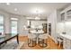 Well-designed kitchen features a center island with seating, stainless steel appliances, and custom cabinetry at 389 Mill Creek Ne Bnd, Atlanta, GA 30307