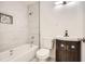Updated bathroom with a shower-tub combo, a new vanity, and modern fixtures at 4201 Regal Ridge Rd, Austell, GA 30106