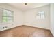 Bright bedroom with newly installed flooring, windows, and fresh paint at 4201 Regal Ridge Rd, Austell, GA 30106